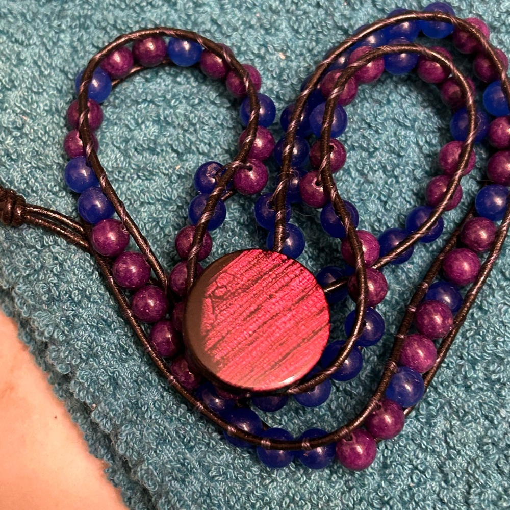 Purple and Blue Beaded wristband with Purple Pendant.